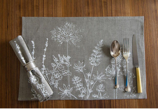 set of two linen placemats with hand screen printed floral design