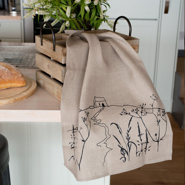 https://www.helenround.com/cdn/shop/products/linen-tea-towel-with-rame-head-design-273558_grande.jpg?v=1661444410